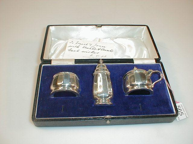A cased silver three piece silver cruet by Walker Hall