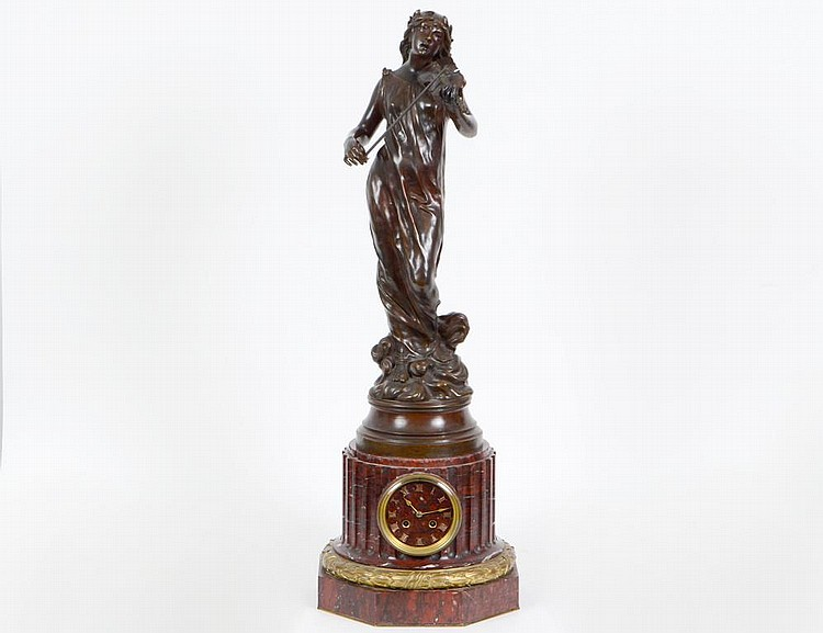 NAPOLEAN III BRONZE AND RED MARBLE FIGURAL CLOCKFrench Circa 1880