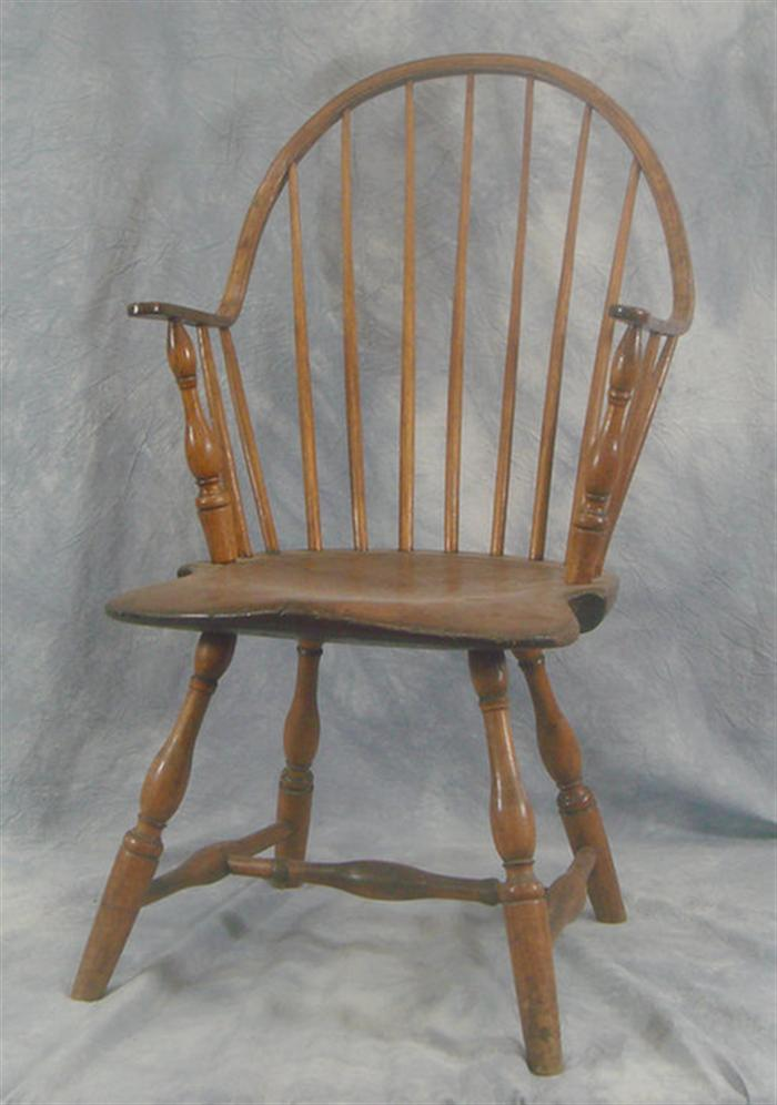 Seven spindle continuous arm Windsor chair 36 h Estimate 200