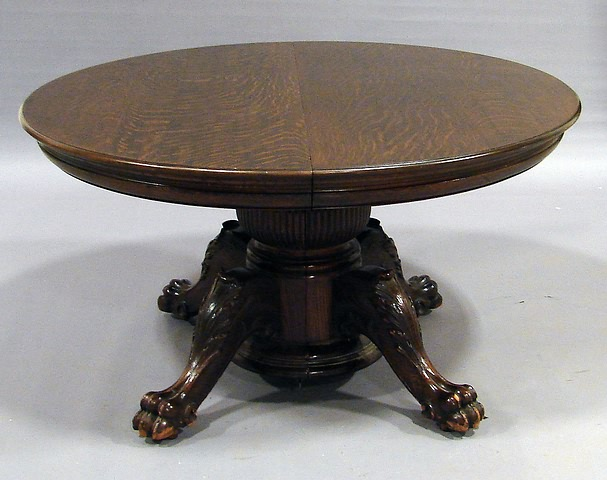 Fluted round split pedestal with turned center support 4 cabriole