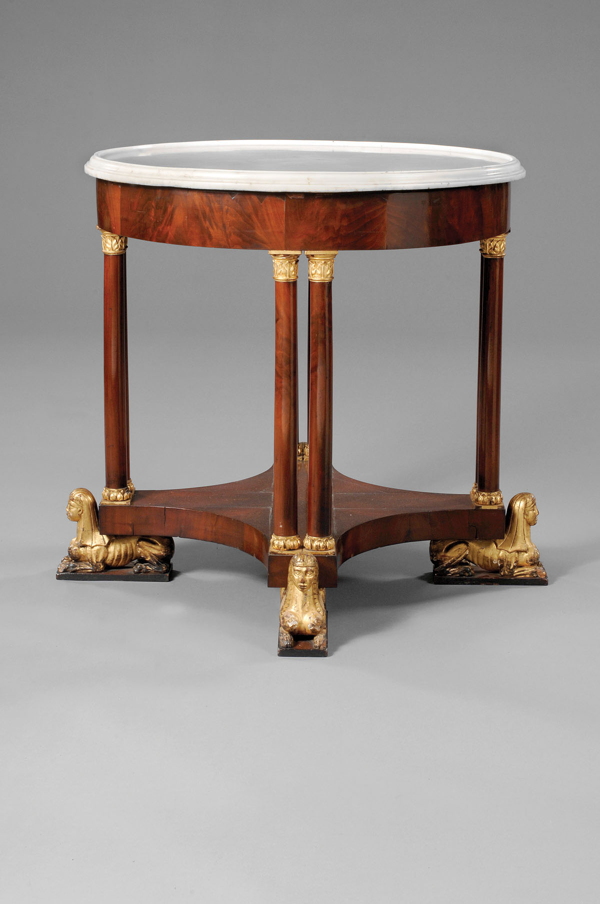 AMERICAN EGYPTIAN REVIVAL MAHOGANY MARBLE TOP CENTER TABLE The dish