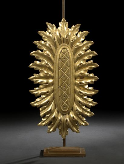 Large Italian Carved Giltwood Elliptical Votive Sunburst in the neoclassical