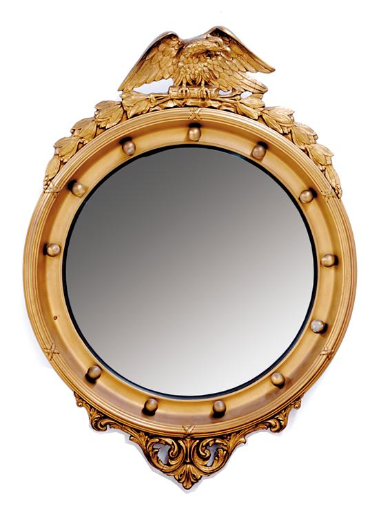 Regency style bullseye mirror late 19th early 20th century carved