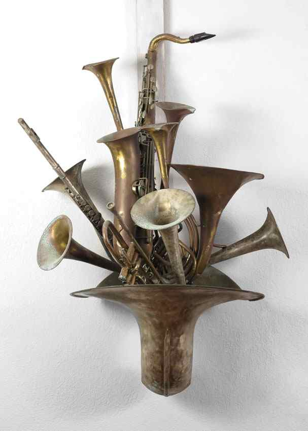 MUSICAL INSTRUMENT WALL FOUNTAIN A unique wall fountain created by