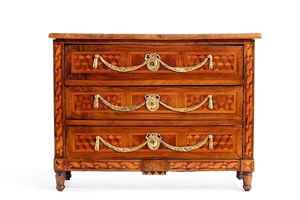 An Italian Neoclassical miniature commode An Italian Neoclassical gilt bronze