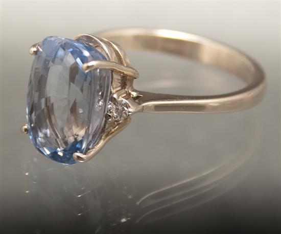 Lady s white gold diamond and periwinkle gemstone ring center