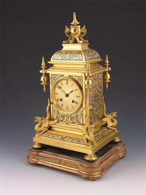 A French gilt brass and enamel mantel clock striking movement