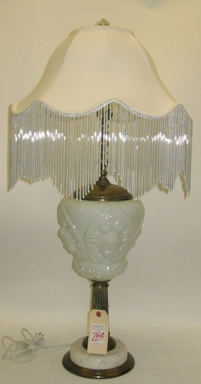 AN AMERICAN MILKGLASS AND BEADED TABLE LAMP having a blown