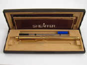 A gold plated Shaeffer ball point pen unused in original