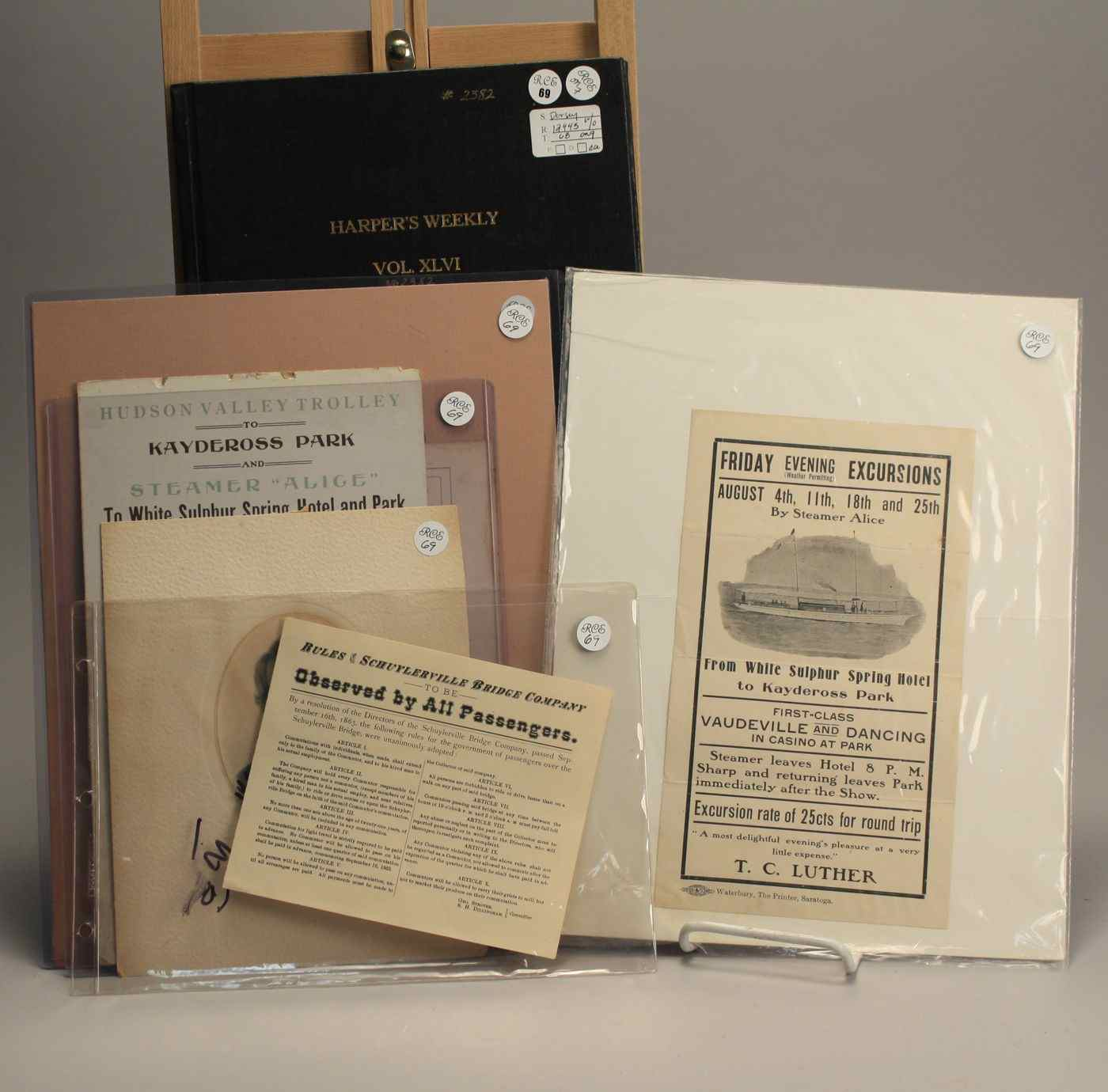 NINE PIECES OF EPHEMERA1 Matted advertisement of sale for Interlaken