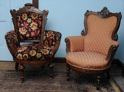 TWO AMERICAN RENAISSANCE REVIVAL CARVED WALNUT ARMCHAIRS One armchair with