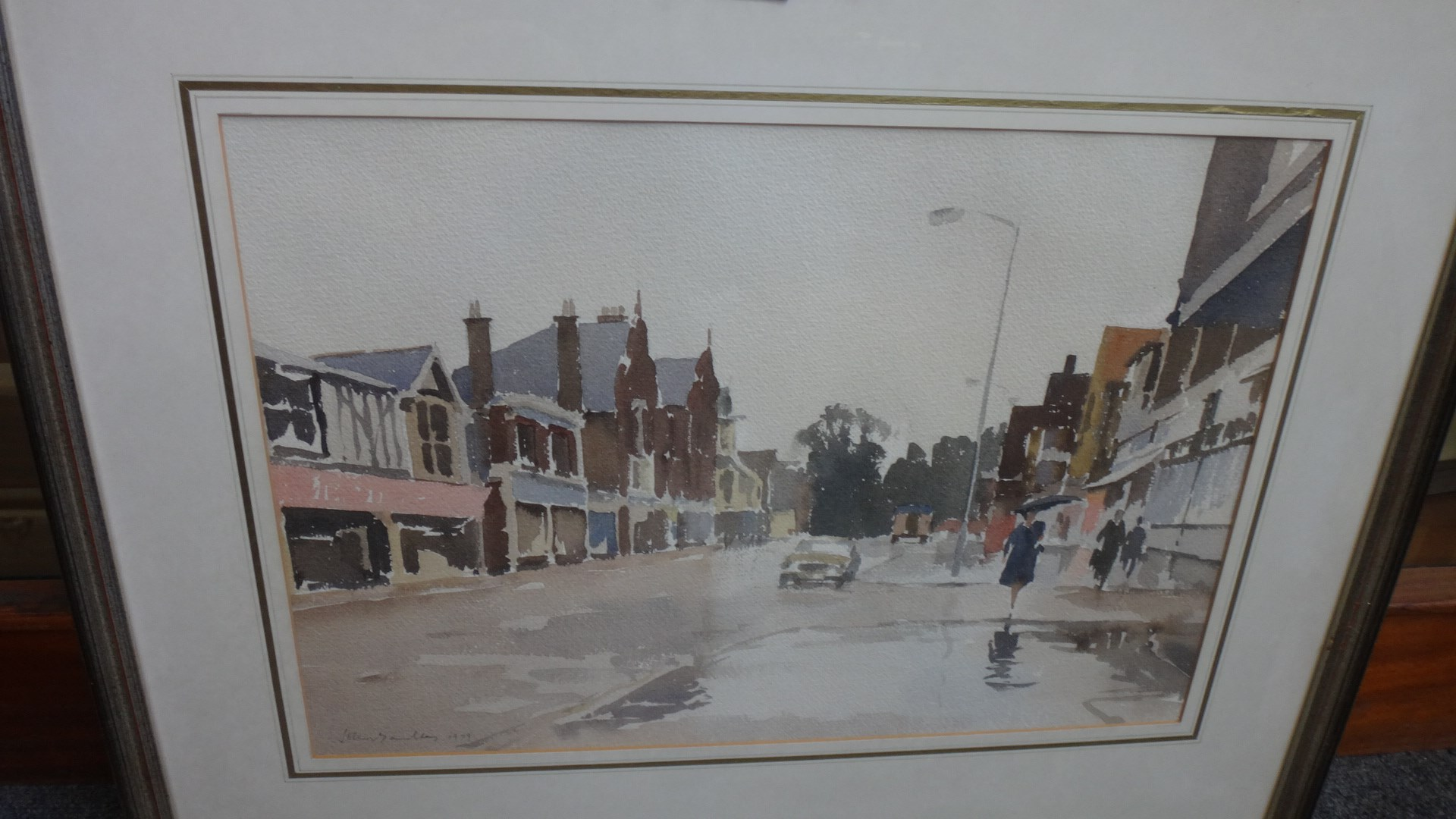 John Yardley b 1933 Street scene in rain watercolour signed