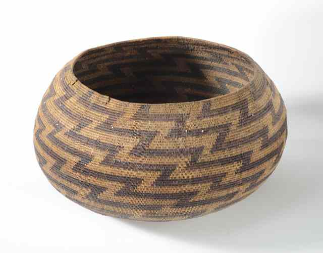 POMO INDIAN BASKET having white beads in the weave accenting