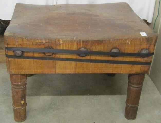 ANTIQUE BUTCHER BLOCK TABLE American c 1900 having a large