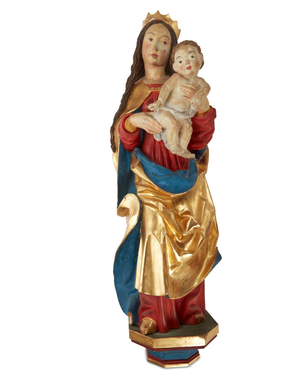 A North European Baroque style carved wood Madonna and Child