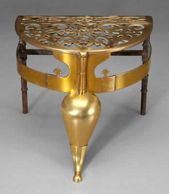 Brass trivet or coachman heavy brass construction with iron rear