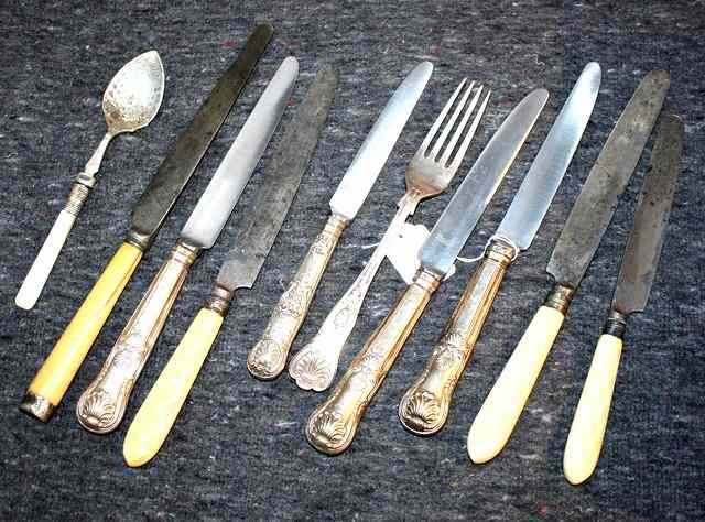 THREE SILVER HANDLED KINGS PATTERN TABLE KNIVES four ivory handled