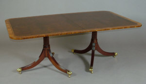 A mahogany twin pedestal dining table late 20th century the