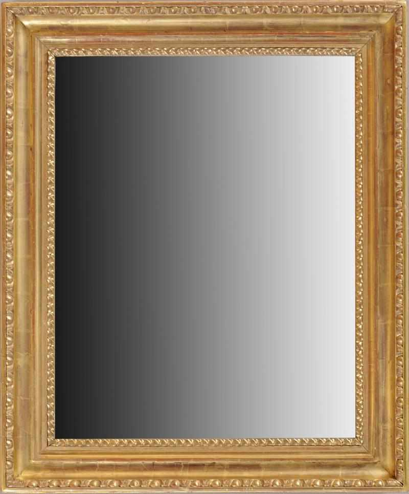 AUSTRIAN NEOCLASSICAL CARVED GILTWOOD MIRROR The frame with petal tip