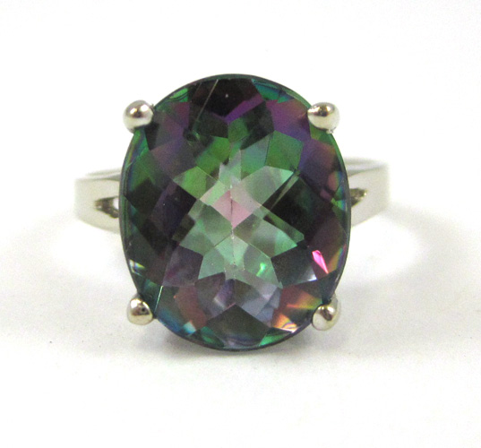 MYSTIC TOPAZ AND FOURTEEN KARAT GOLD RING The white gold