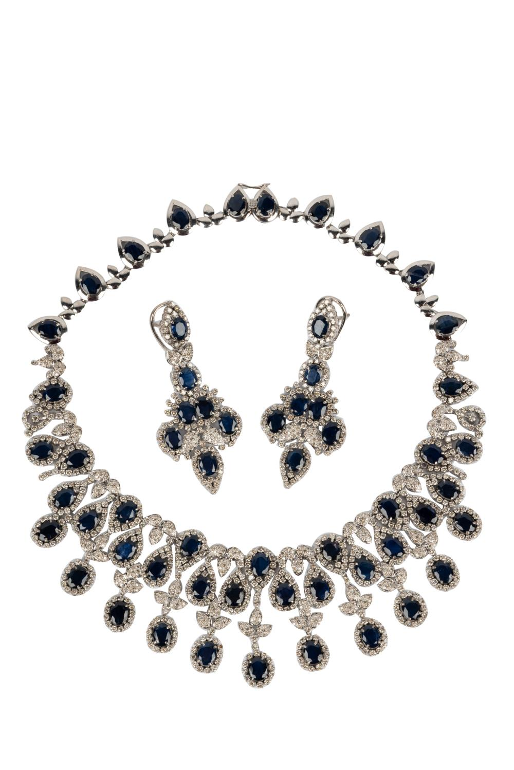 18 KARAT WHITE GOLD SAPPHIRE DIAMOND SUITEcomprising a necklace and
