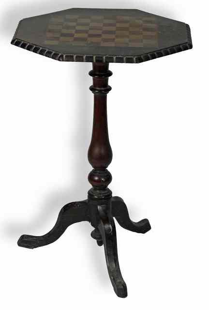 A Victorian figured walnut and inlaid chess table the octagonal