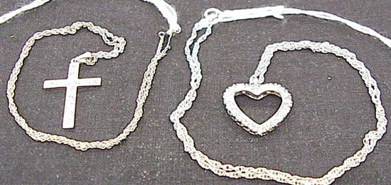 JEWELRY Two 14K white gold diamond pendants one is in