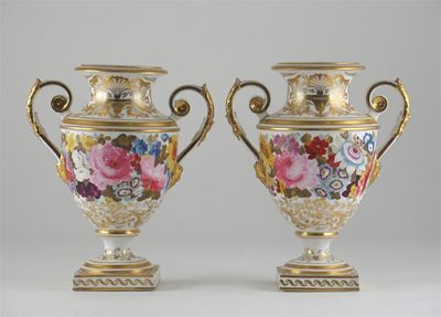 A pair of Derby two handled vases painted with flowers