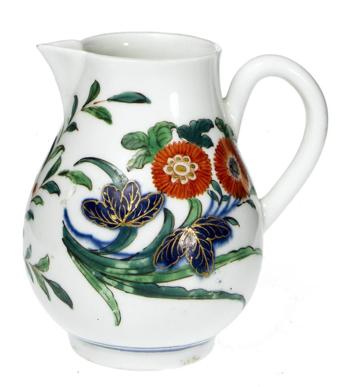 A FIRST PERIOD WORCESTER SPARROW BEAK JUG painted in underglaze