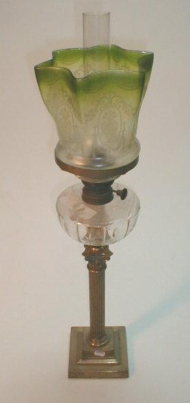 A late 19thC Corinthian columned brass oil lamp on stepped