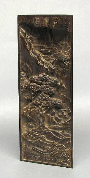 A carved hardwood wrist rest 20th Century The tree trunk
