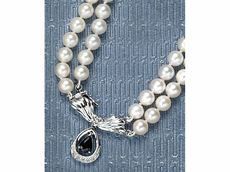 DOUBLE STRAND PEARLS Pearls measuring 6 5mm with 14k white
