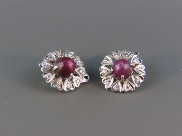 Ruby Diamond Earrings each with a cabochon cut star ruby