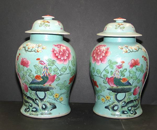 A pair of famille rose and turquoise enameled porcelain covered