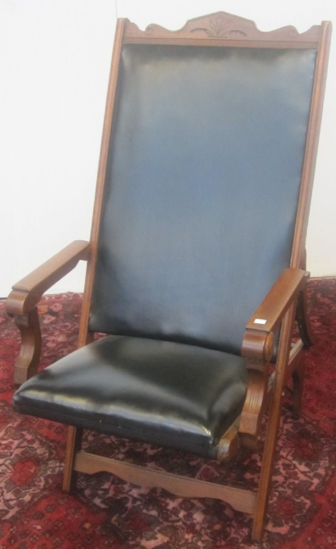 ARM CHAIR A victorian East Lake style walnut framed open