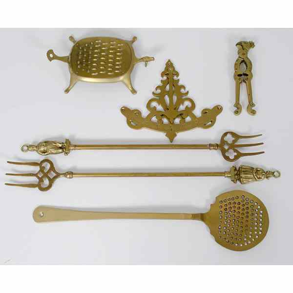 Brass Kitchen Utensils English and Continental A group of brass