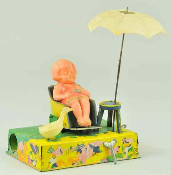 BOARDWALK DELIGHT Japan CK celluloid child seated at chair w