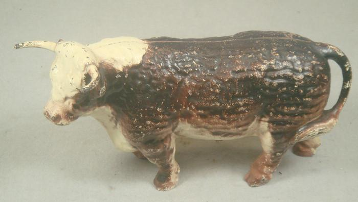 Cast iron doorstop large free standing brown and tan bull