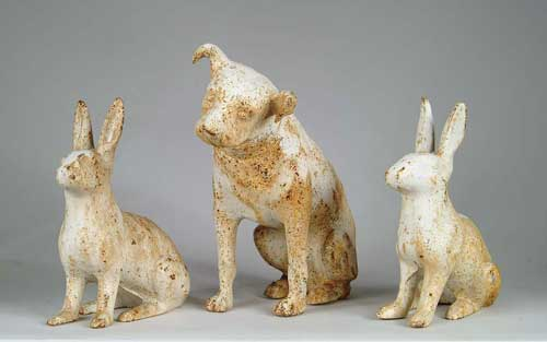 PAIR OF CAST IRON RABBITS AND CAST IRON DOG The