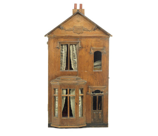 A fine wooden dolls house English circa 1880 The natural