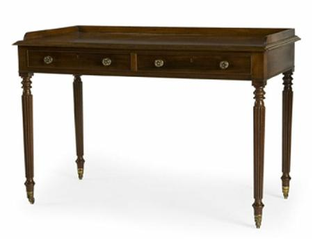 A George IV mahogany side table In the manner of