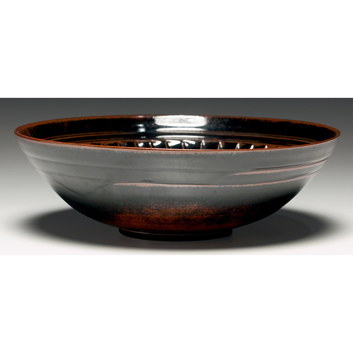 Laura Andreson bowl flaring shape with interior ribs under a