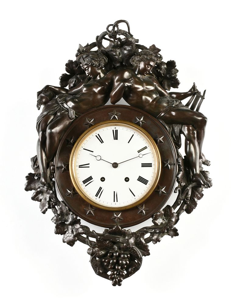 A NAPOLEON III PATINATED METAL FIGURAL CARTEL CLOCK BY EDOUARD