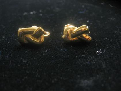18 karat yellow gold knot form earrings Tiffany Co Screw