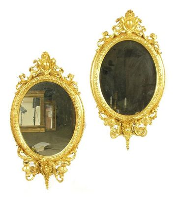 A pair of 19th century gilt wood and gesso girandoles