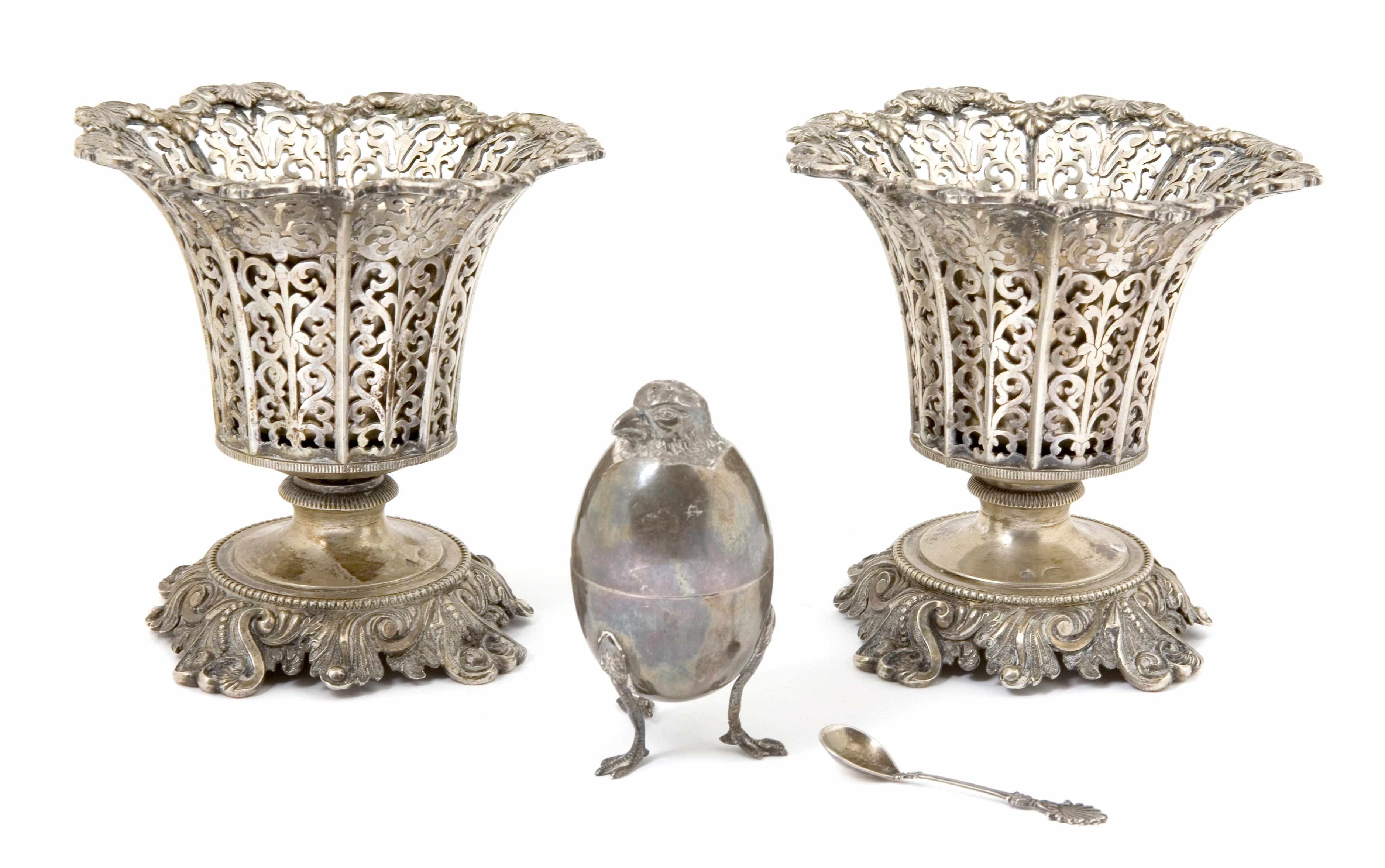 A pair of Turkish silver pierced urns and a French