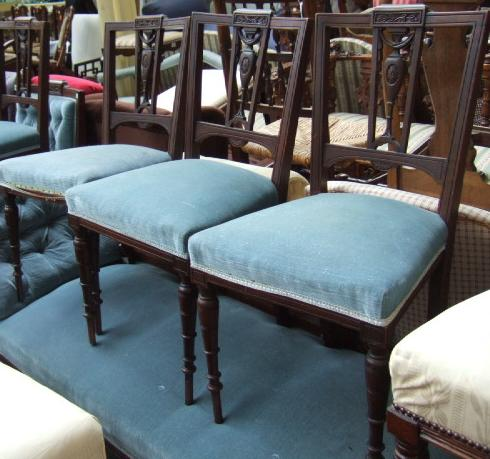 A Victorian mahogany framed salon suite comprising a chaise longue