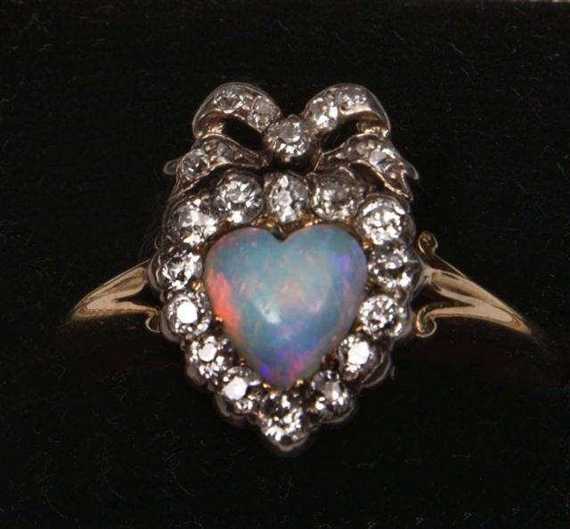 AN EARLY VICTORIAN OPAL AND DIAMOND SET RING heart shaped