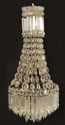 A cut glass ceiling light the petal decorated corona to