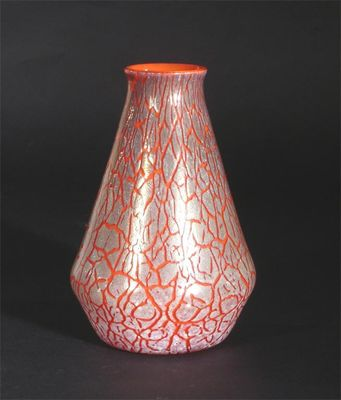 A Monart Cloisonne vase coral red cased in clear with